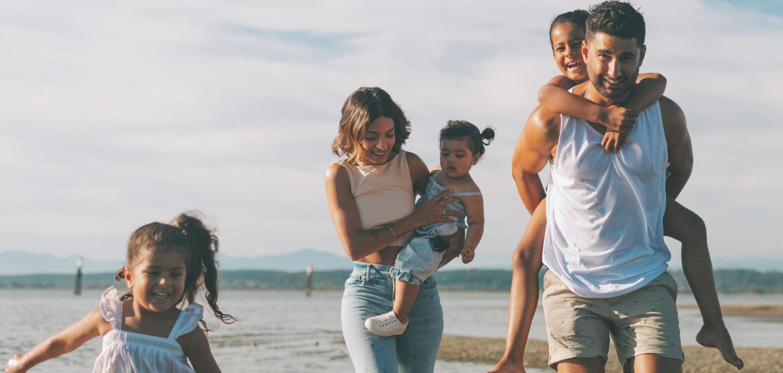 Family on a UK dependant visa on a beach